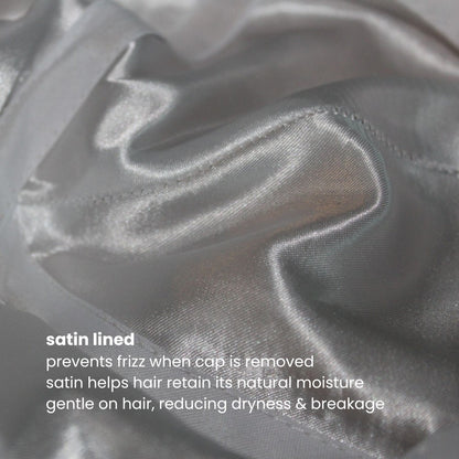 Close-up of the satin lining inside the Miae Beige Satin-Lined Cap, with text highlighting its benefits: preventing frizz, retaining moisture, and reducing breakage while maintaining a stylish, face-flattering fit.