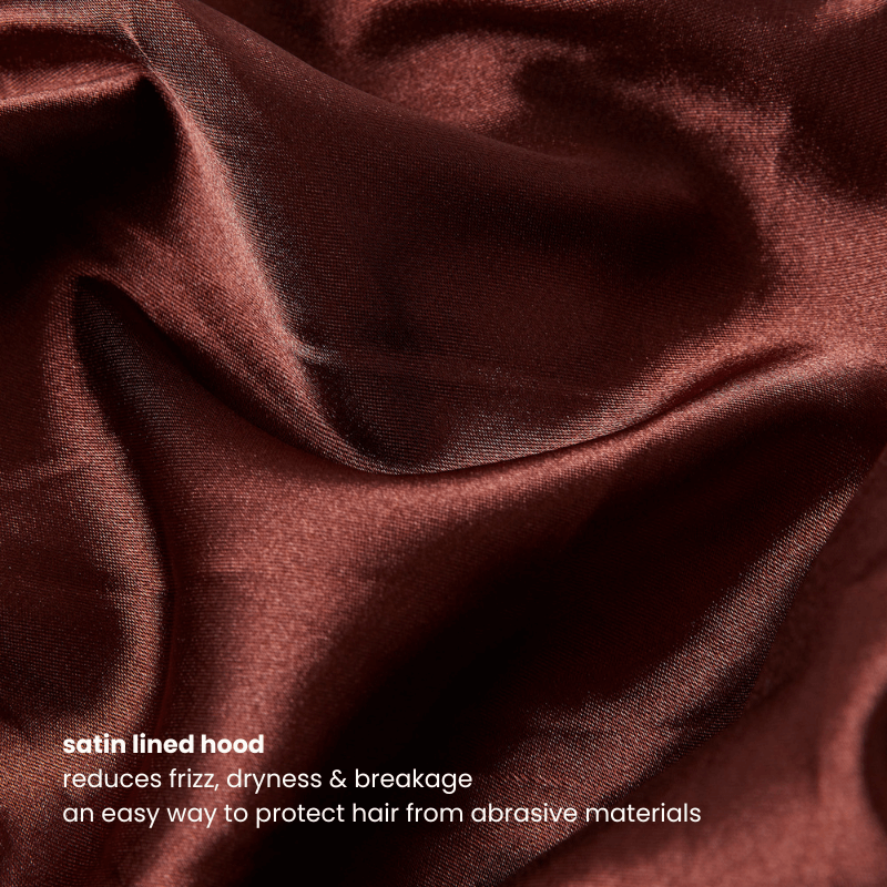 Close-up of the brown hoodie’s satin-lined hood, ideal for reducing friction and dryness on curly and natural hair