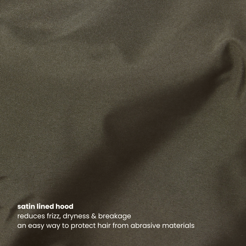 Close-up of the satin-lined hood of the Miae Dark Khaki Hoodie, designed to reduce frizz, dryness, and breakage while protecting from abrasive materials.