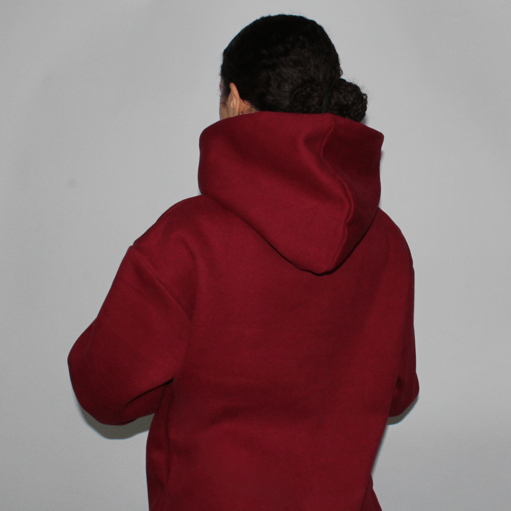 Back view of the Miae Maroon Satin-Lined Hoodie on a model, displaying a flattering, comfortable fit and satin-lined hood.