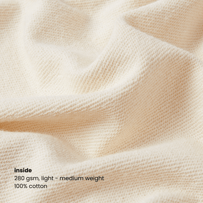 Close-up of the cotton fabric inside the Miae Beige Zip Hoodie, highlighting its soft 280gsm texture
