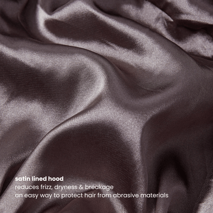 Close-up of the satin-lined hood inside the charcoal hoodie, designed to reduce frizz, friction, and breakage